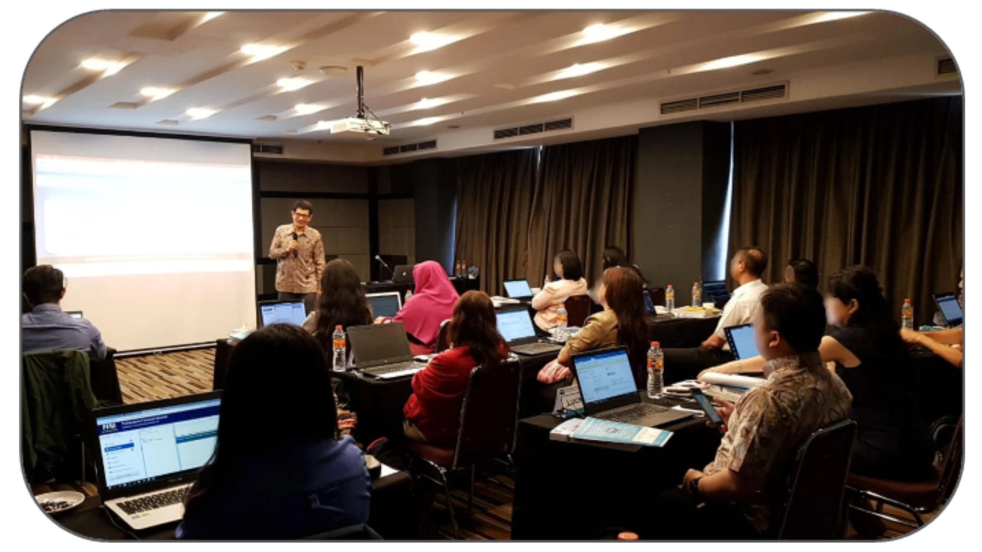 Instructor delivering a PFM preparation class